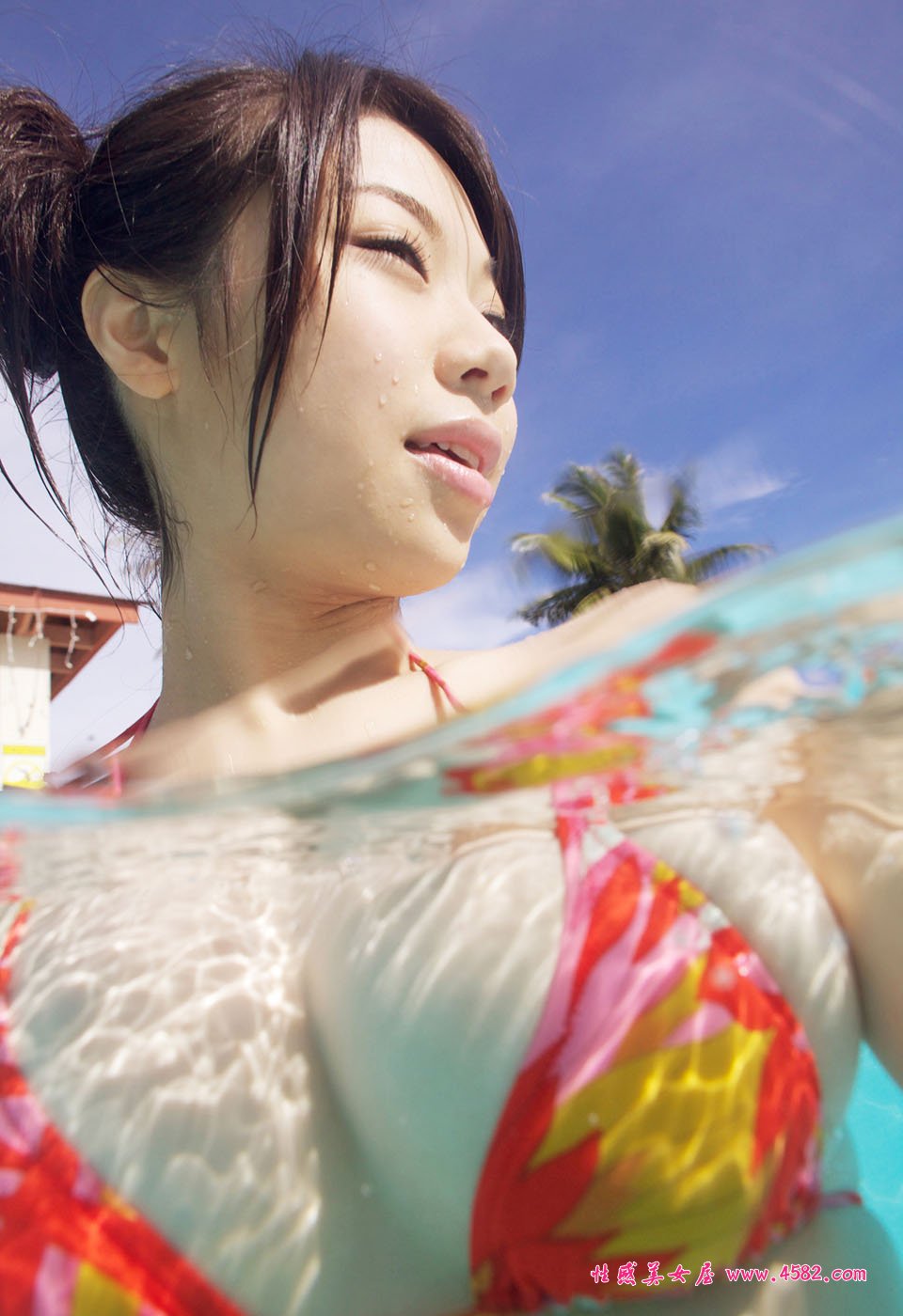 Pretty Chinese Lady In Swimming Pool With XL Big